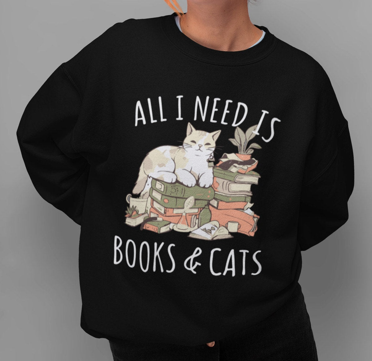 Tout ce dont j'ai besoin c'est de livres et de chats