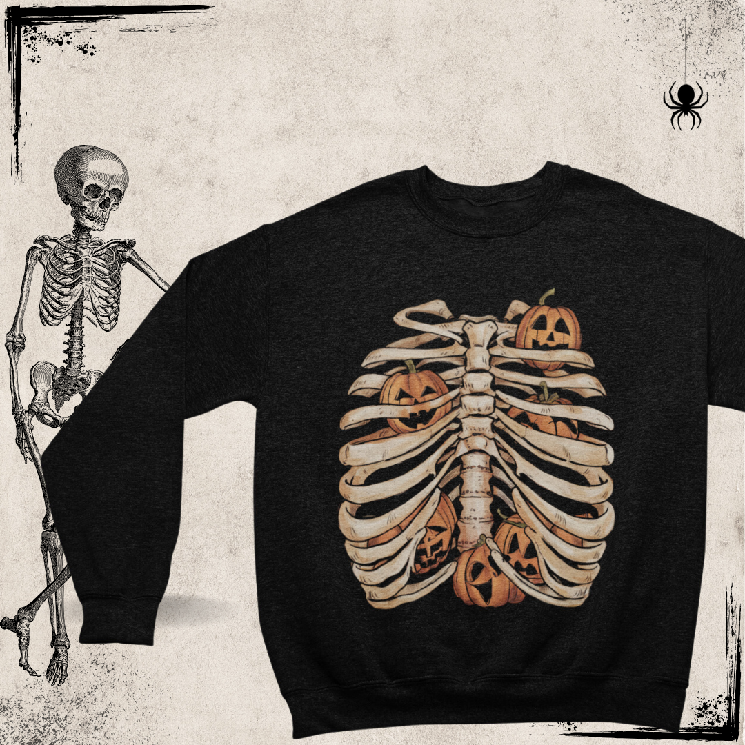 a sweater with a skeleton and pumpkins on it