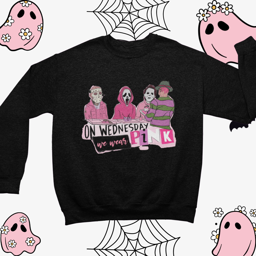 a black sweater with a picture of a group of people on it