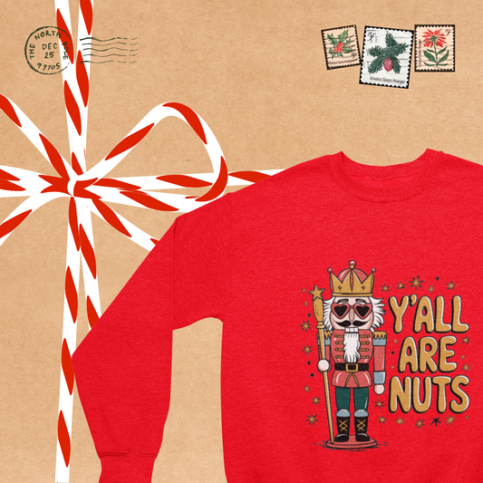 "Close-up of the whimsical nutcracker graphic on the Y'all Are Nuts Nutcracker Crew Neck sweatshirt."