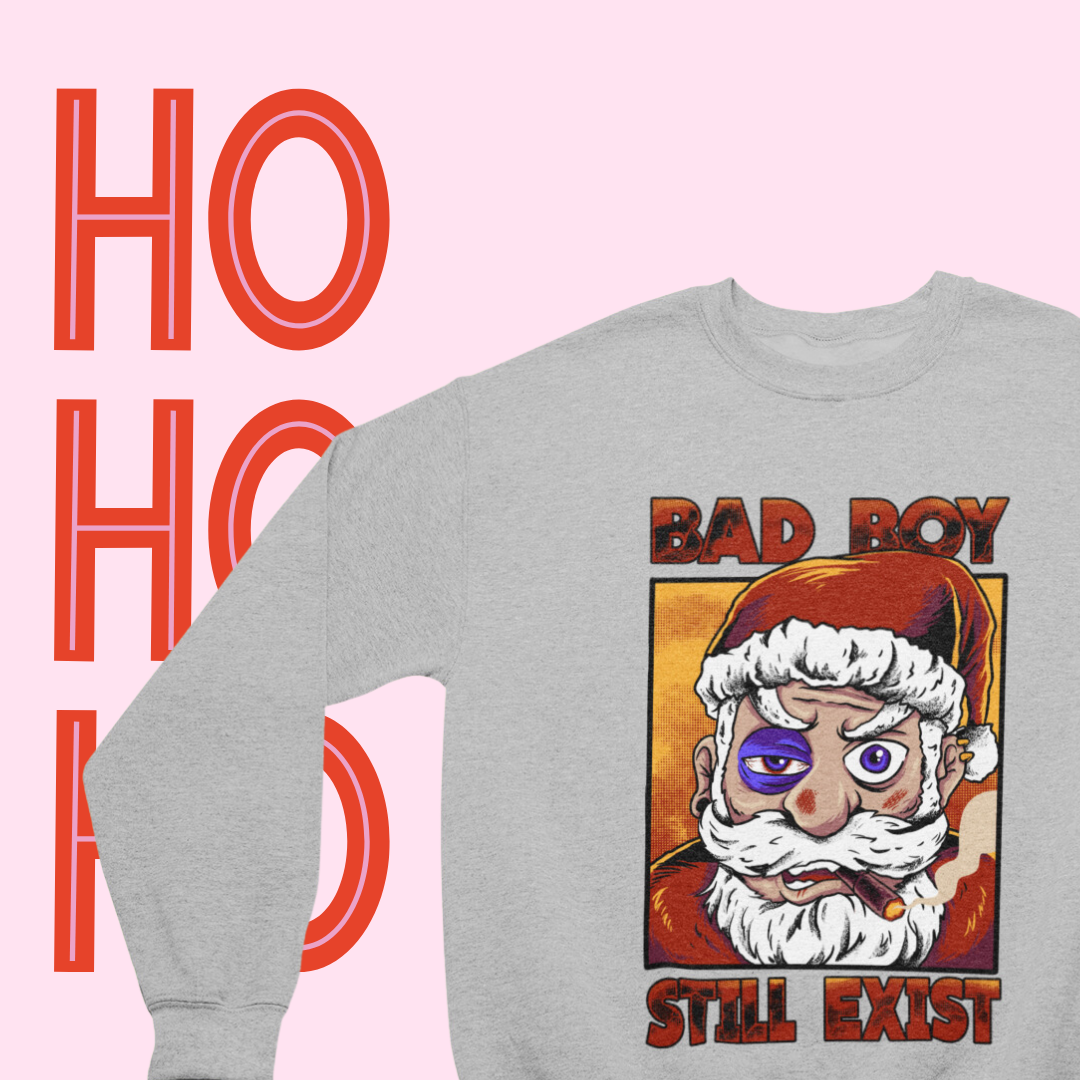 "Close-up of the 'Bad Boy Santa' text on a cozy crewneck sweatshirt."