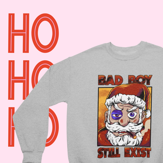 "Close-up of the 'Bad Boy Santa' text on a cozy crewneck sweatshirt."