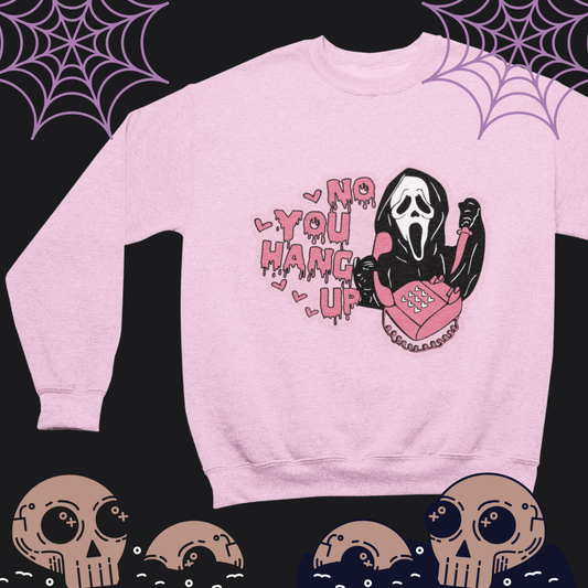 a pink sweater with a skeleton on it