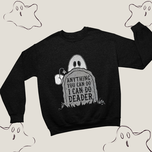 a black sweater with a ghost on it