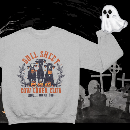 a sweatshirt that says pull sheet cow lover club with a ghost in the background