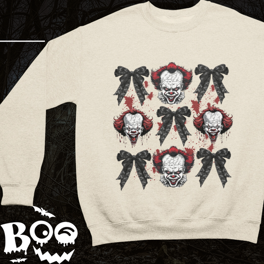 a white sweater with a picture of a clown's face on it