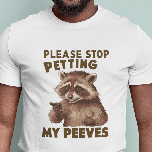  humorous raccoon graphic tee with the text 'Stop Petting My Peeves', perfect for those who embrace their quirks and individuality