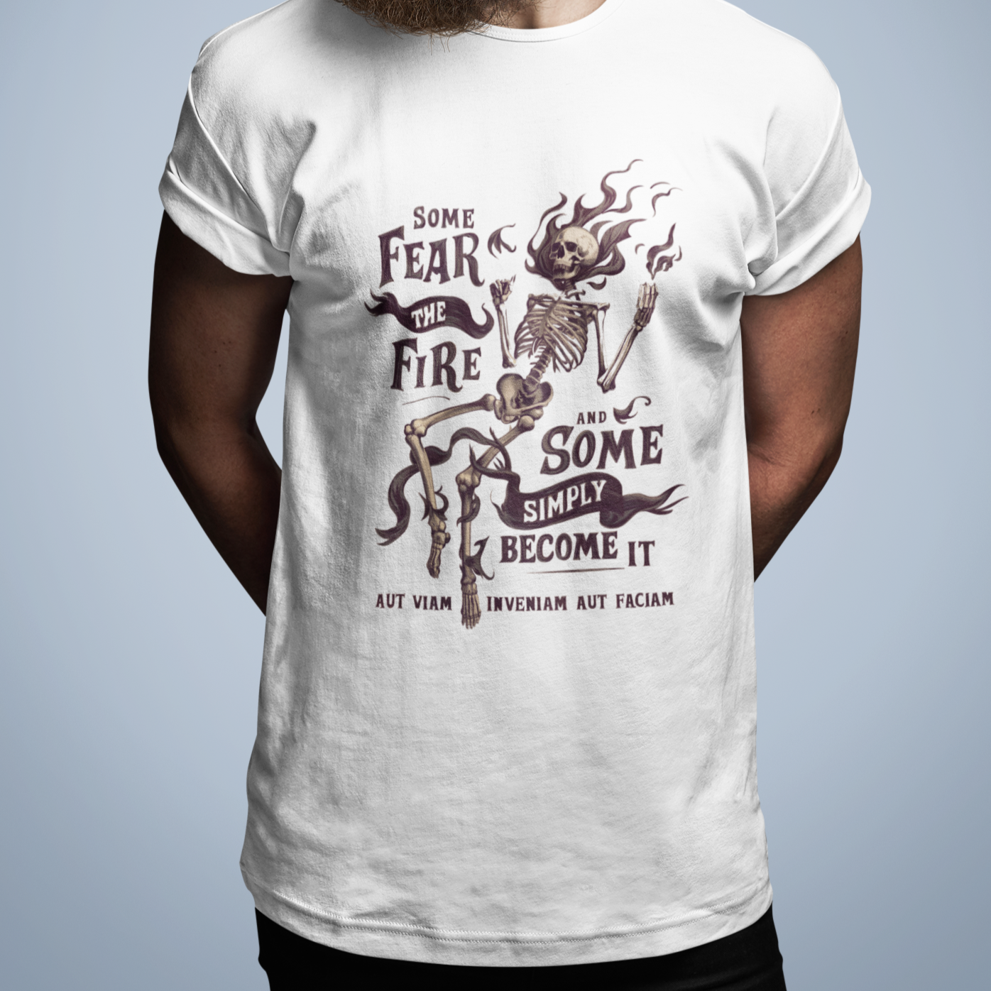 Graphic t-shirt with inspirational quote 'Some Fear the Fire and Some Simply Become It'