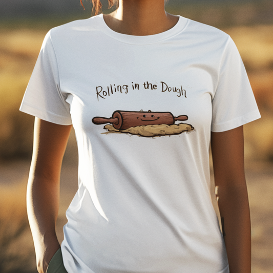 Graphic t-shirt with rolling pin and flour sack design, featuring pun 'Rolling in the Dough